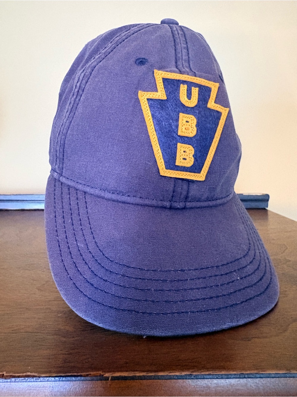 United by Blue Baseball Cap with Gold Patch